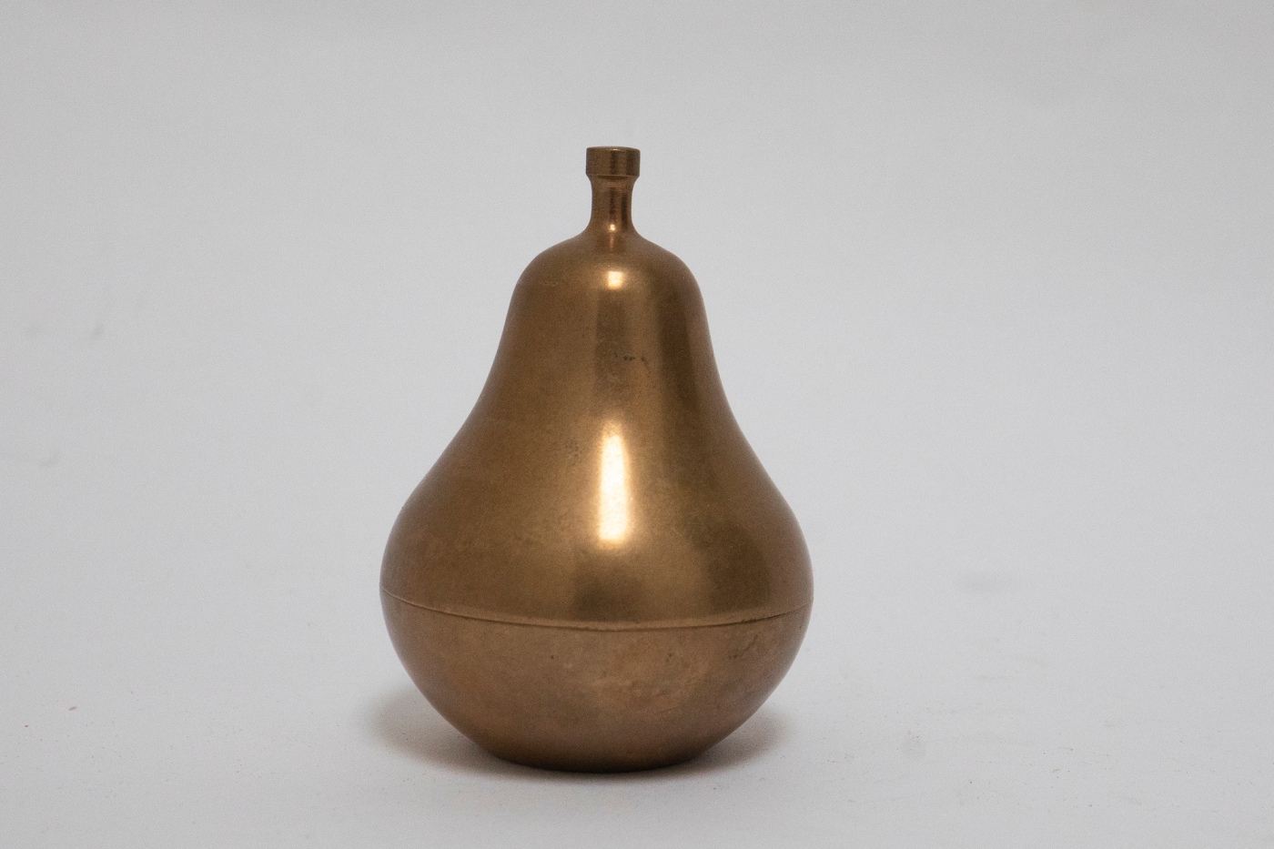 Small vintage pear shaped box in brass